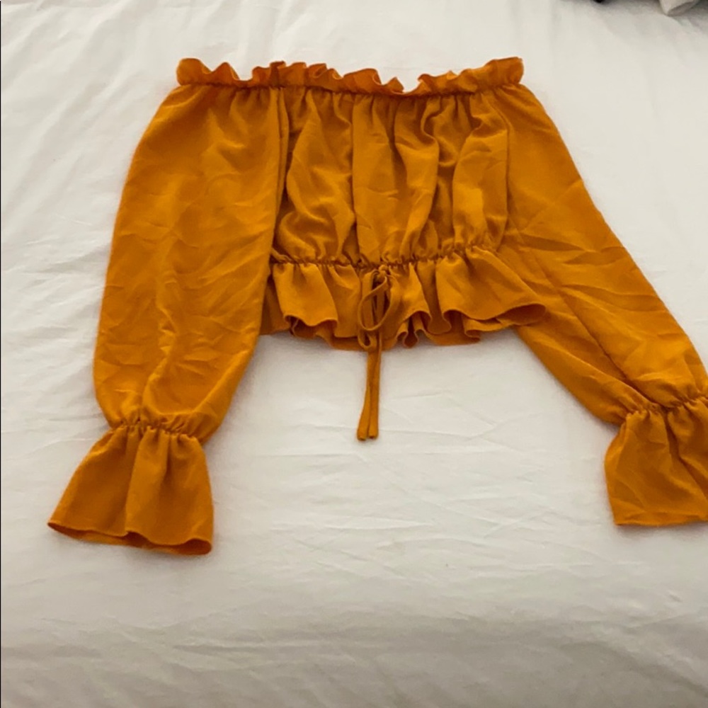 Rust orange sinched off the shoulder top